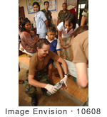 #10608 Picture Of A Doctor Assisting A Child
