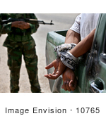 #10765 Picture Of An Iraqi Policeman With Suspect