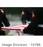 #10766 Picture Of Men Holding A Flag After A Funeral Ceremony