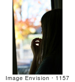 #1157 Picture Of A Woman Looking Out A Window