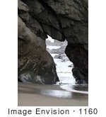 #1160 Picture Of A Cave In A Rock At The Beach