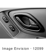 #12099 Picture Of A Door Handle And Power Buttons In A Car