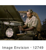 #12749 Picture of a African American Mechanic Working on a Motor by JVPD