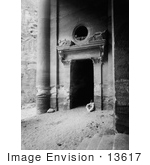 #13617 Picture of a Man Seated in a Doorway Under the Vestibule of the Treasury at Petra by JVPD