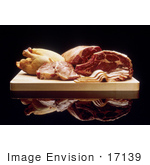 #17139 Picture Of Red Meat Bacon And Poultry On A Wooden Cutting Board