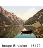 #18175 Photo Of Men In A Boat On Klonthal Lake Glarus Switzerland