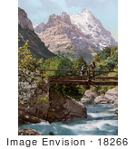 #18266 Photo Of People On A Footbridge Over A River View Of Wetterhorn Mountain Grindelwald Bernese Oberland Switzerland