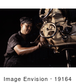 #19164 Photo Of A Mechanical Operator Working On Boiler Parts