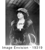 #19319 Photo of a Woman, Aurelia H. Reinhardt, Wearing a Fur-Trimmed Coat and Standing With Her Hands in a Muff by JVPD