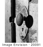 #20091 Stock Photo: Oval Door Knob And Skeleton Key Hold On A Door At The Kandt-Domann Farmstead