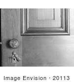 #20113 Stock Photo: Door Paneling Knob And Open Key Plate With Skeleton Key Inside