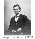 #20238 Historical Stock Photography: Abraham Lincoln Holding His Spectacles While Sitting 1865