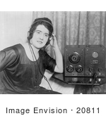 #20811 Stock Photography Of A Woman Wearing Radio Headphones