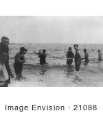 #21088 Stock Photography Of A Group Of Men Wading In Waist Deep Water And Playing Baseball In The Water