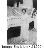 #21209 Stock Photography Of Alice Paul Standing In Front Of A Banner With Stars Holding Up A Glass