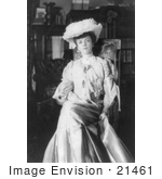 #21461 Stock Photography Of Alice Roosevelt Longworth In A Hat And Dress Sitting In A Chair