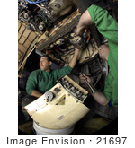#21697 Stock Photography Of United States Navy Men Removing An Electrical Generator From A F/A-18c Hornet