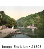 #21858 Historical Stock Photography Of A Man Rowing A Boat Ashore On The Old Mill Creek Dartmouth Devon England