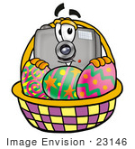 #23146 Clip Art Graphic Of A Flash Camera Cartoon Character In An Easter Basket Full Of Decorated Easter Eggs