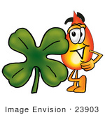 #23903 Clip Art Graphic Of A Fire Cartoon Character With A Green Four Leaf Clover On St Paddy’S Or St Patricks Day