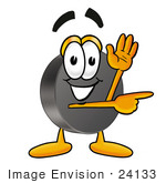#24133 Clip Art Graphic Of An Ice Hockey Puck Cartoon Character Waving And Pointing