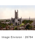 #26784 Stock Photography Of The Gloucester Cathedral And Steeple Of Another Church Surrounded By Buildings In Gloucester England Uk