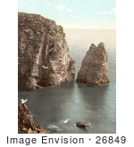 #26849 Stock Photography Of Seagulls Flying Over The Water Near Loaf Rock At Port St Mary Isle Of Man England