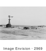 #2969 Stock Photography of an Abandoned Farm and Windmill in the Dust Bowl Near Dalhart Texas by JVPD