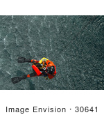 #30641 Stock Photo Of A Coast Guard Rescue Diver Being Hoisted Back Up From The Water After Rescuing A Practice Dummy