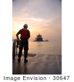 #30647 Stock Photo Of A Navy Sailor Standing On The Deck Of The Improved Navy Lighterage System (Inls) Discharge Facility