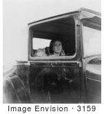 #3159 Woman Sitting In A Car