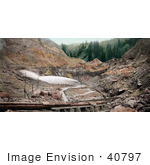 #40797 Stock Photo Of Hydraulic Placer Mining Pipes Spraying Water Against Stone Colorado