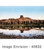 #40832 Stock Photo Of A Factory At The Base Of A Butte Reflecting In Green River Utah