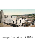 #41015 Stock Photo Of A Pueblo Native Standing Among Village Buildings In New Mexico
