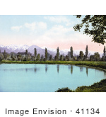 #41134 Stock Photo Of Trees Along The Water At Liberty Park With Views Of The Wasatch Range Mountains Salt Lake City Utah