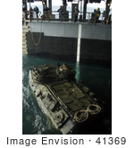 #41369 Stock Photo Of United States Marines Rotating Their Amphibious Assault Vehicle In The Well Deck Of An Amphibious Dock Landing Ship