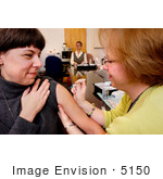 #5150 Stock Photography of a Nurse Giving a Flu Shot to Her Patient by JVPD
