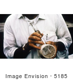 #5185 Stock Photography Of A Researcher Discharging Mosquitoes From The Catch-Tube Of A Hand-Held Mechanical Aspirator