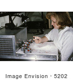 #5202 Stock Photography Of A Laboratorian Working With Mosquito Filled Tubes That Were Used In A Virus Isolation Study