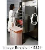 #5324 Picture Of A Female Scientist Working With An Early Model Autoclave System