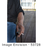 #53728 Royalty-Free Stock Photo Of A Hand Holding Cigarette