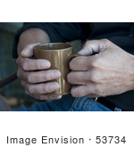 #53734 Royalty-Free Stock Photo Of A Man Holding A Hot Drink In A Mug
