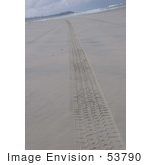 #53790 Royalty-Free Stock Photo Of A Tilted Angle Of Tracks On A Beach