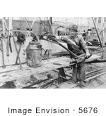#5676 Oil Worker Leaning On Pipe