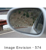 #574 Photograph Of A View In A Rear View Mirror