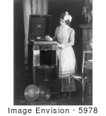 #5978 Woman Playing A Record On Phonograph