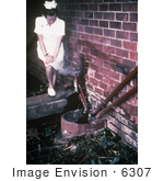 #6307 Picture Of A Nurse Standing Near Sewage Pipes Outside Of An Infectious Disease Hospital In Johannesburg South Africa