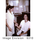 #6310 Picture Of A Nurse Checking The Vital Signs Of An Isolated Hospital Staff