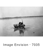 #7035 Stock Photograph Of A Mandan Indian Rowing A Bull Boat