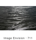 #711 Image Of Sunlight On Wet Sands